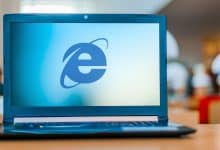 Image of the Internet Explorer logo on a laptop screen.
