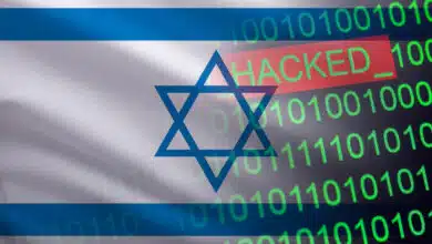 Israel flag with cybersecurity hacked copy in stock image.