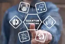 Man using virtual touchscreen with "Quantum Computing" on it.