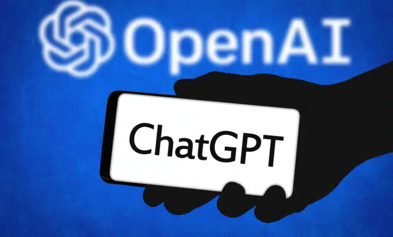 The ChatGPT logo on a phone in front of the OpenAI logo.